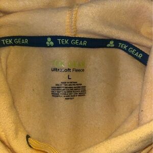 Plain yellow hoodie from TEK GEAR. Size large.